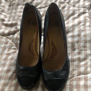 Black leather with patent leather toe.  Very good condition. 6M